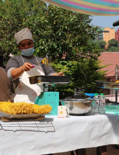 Displaced women ambulant vendors become squash noodle producers
